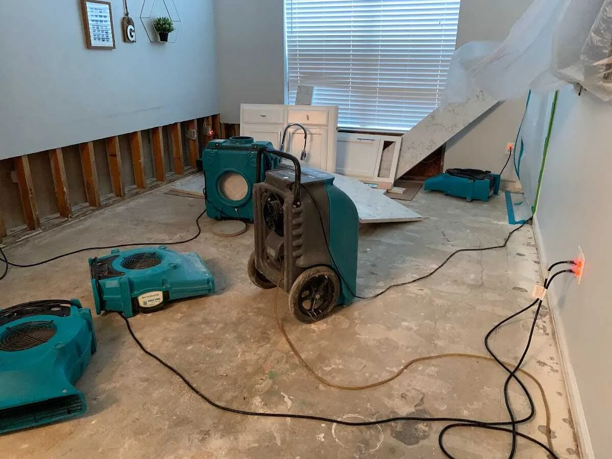 Dehumidifier in flood-cut room for Water Damage Restoration in Oskaloosa